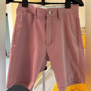 Stretch shorts with mess pockets and inside elastic drawstring.